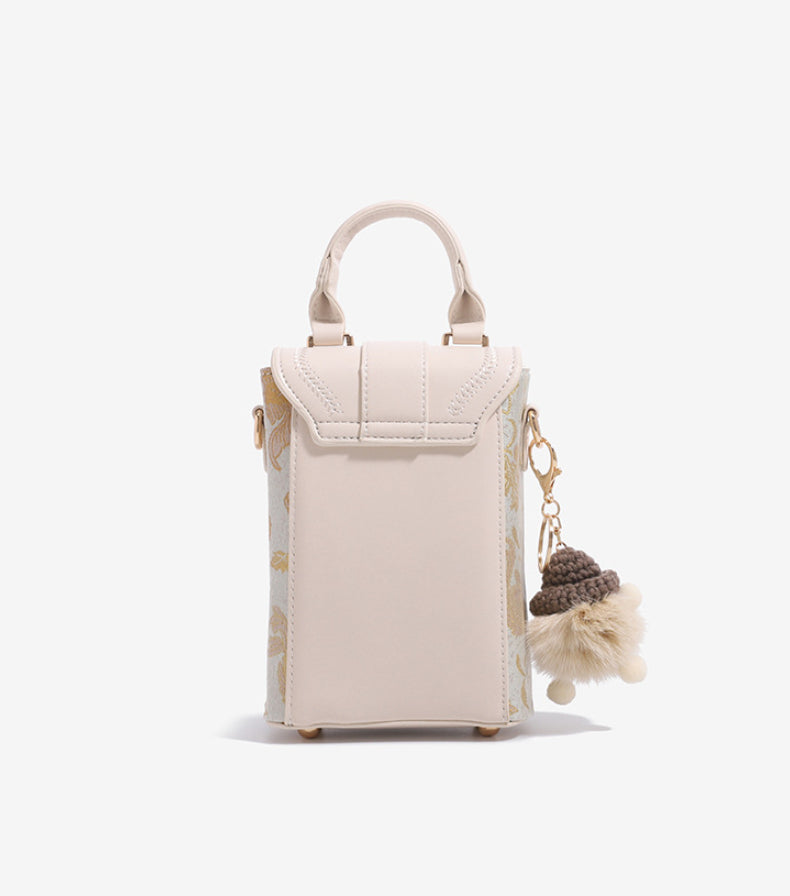 White Elegant Gold Scale Mini Crossbody Bag with top handle and pom-pom charm