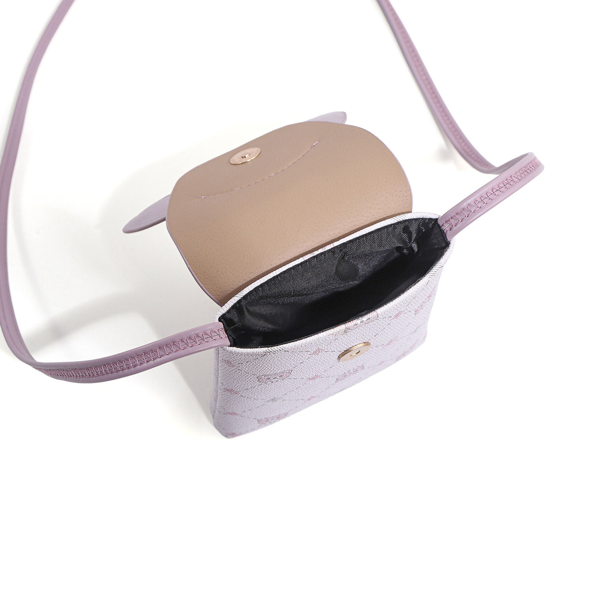 Light purple bunny ear mini crossbody bag with a tan flap and patterned exterior.